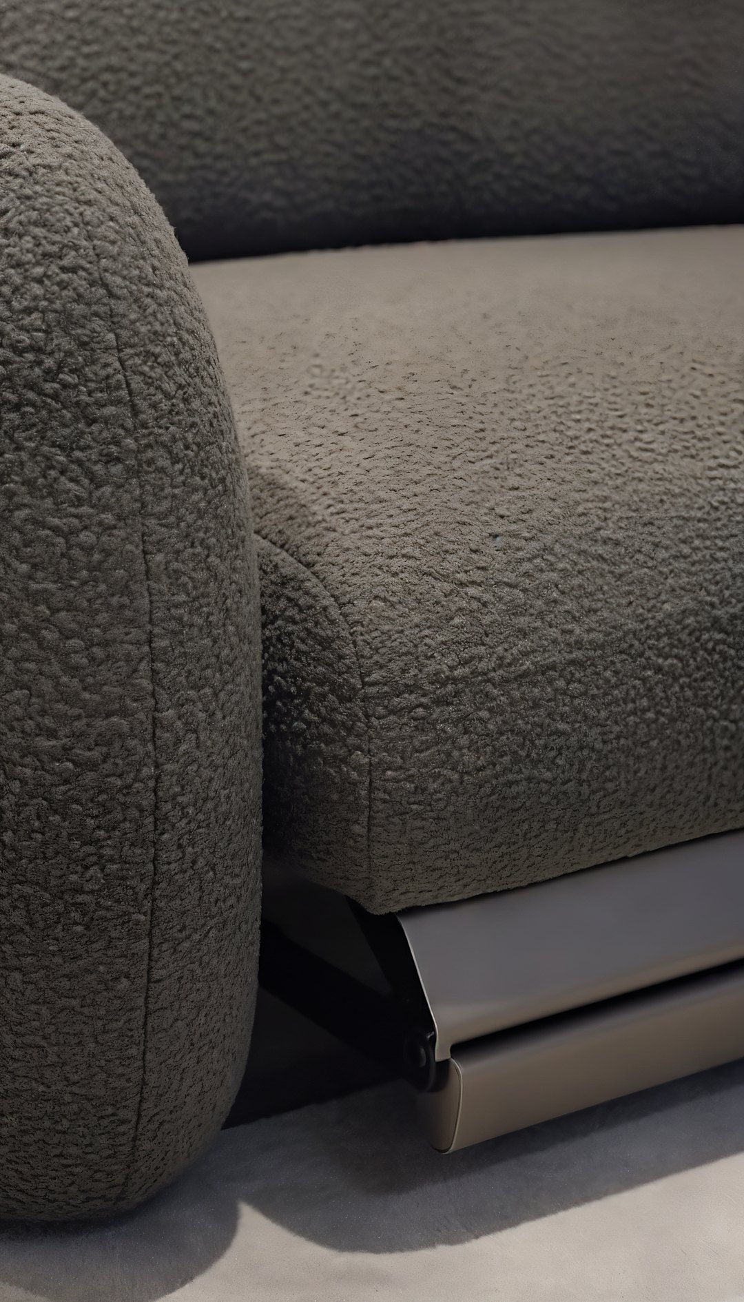 Pormenor da textura do tecido bouclé do sofá-cama